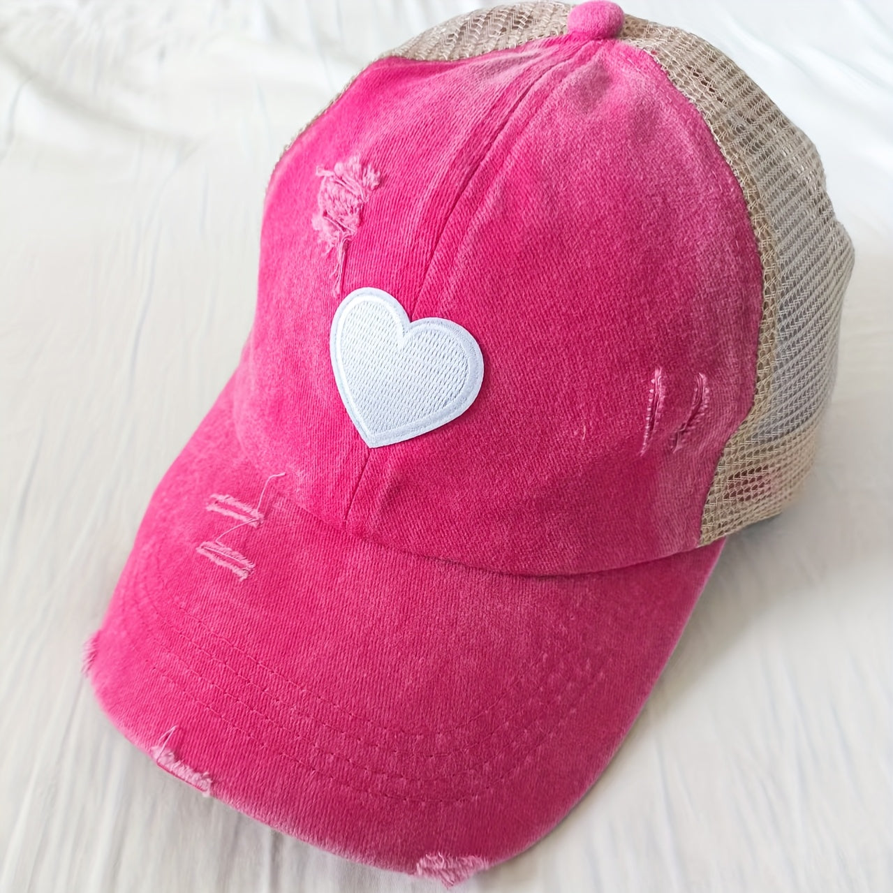 Noor – Verweerde Truckerpet met Hartdetail